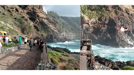 Barn og voksen slått på havet av bølge på Tenerife.